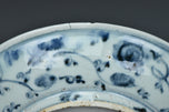 A MING DYNASTY BLUE AND WHITE FIGURAL DISH 16TH CENTURY