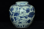 A LATE MING DYNASTY BLUE AND WHITE BOYS JAR