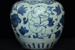 A LATE MING DYNASTY BLUE AND WHITE BOYS JAR