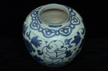 A LATE MING DYNASTY BLUE AND WHITE BOYS JAR