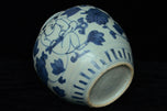 A LATE MING DYNASTY BLUE AND WHITE BOYS JAR