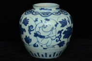 A LATE MING DYNASTY BLUE AND WHITE BOYS JAR