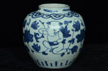 A LATE MING DYNASTY BLUE AND WHITE BOYS JAR