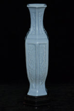 A LATE QING DYNASTY FAMILLE ROSE VASE QIANLONG MARK AND STAND
