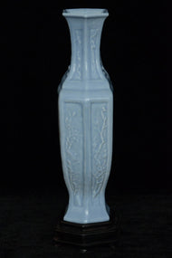 A LATE QING DYNASTY FAMILLE ROSE VASE QIANLONG MARK AND STAND