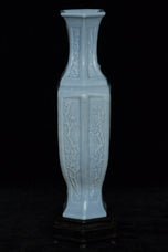 A LATE QING DYNASTY FAMILLE ROSE VASE QIANLONG MARK AND STAND