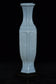 A LATE QING DYNASTY FAMILLE ROSE VASE QIANLONG MARK AND STAND