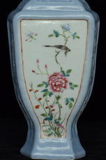 A LATE QING DYNASTY FAMILLE ROSE VASE QIANLONG MARK AND STAND