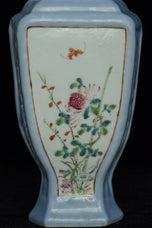A LATE QING DYNASTY FAMILLE ROSE VASE QIANLONG MARK AND STAND