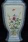A LATE QING DYNASTY FAMILLE ROSE VASE QIANLONG MARK AND STAND