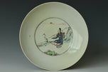 A QING DYNASTY FIGURAL DISH KANGXI MARK AND PERIOD