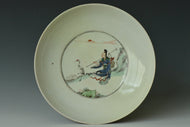 A QING DYNASTY FIGURAL DISH KANGXI MARK AND PERIOD