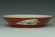 A QING DYNASTY FIGURAL DISH KANGXI MARK AND PERIOD