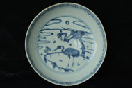 A LATE MING DYNASTY BLUE AND WHITE DISH JIAJING MARK