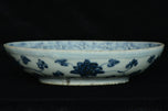 A LATE MING DYNASTY BLUE AND WHITE DISH JIAJING MARK