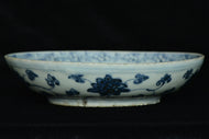 A LATE MING DYNASTY BLUE AND WHITE DISH JIAJING MARK