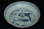 A LATE MING DYNASTY BLUE AND WHITE DISH JIAJING MARK