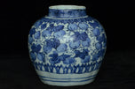 A LATE MING DYNASTY BLUE AND WHITE JAR