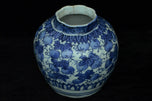 A LATE MING DYNASTY BLUE AND WHITE JAR