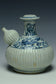 A LATE MING DYNASTY BLUE AND WHITE KENDI