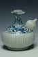 A LATE MING DYNASTY BLUE AND WHITE KENDI