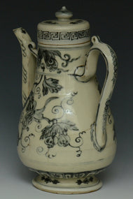 AN EARLY MING DYNASTY BLUE AND WHITE WINE EWER EX. CHRISTIE'S 2009