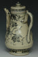 AN EARLY MING DYNASTY BLUE AND WHITE WINE EWER EX. CHRISTIE'S 2009