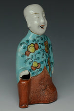 A QING DYNASTY FIGURE OF BOY QIANLONG PERIOD EX. CHRISTIE'S 2012
