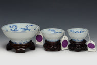 THREE DRAGON CUPS YONGZHENG MARK AND PERIOD AND STAND EX. SOTHEBY'S