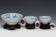 THREE DRAGON CUPS YONGZHENG MARK AND PERIOD AND STAND EX. SOTHEBY'S
