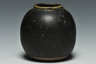 A TANG DYNASTY BLACK GLAZED JAR