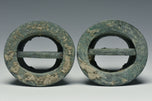 TWO HAN DYNASTY BRONZE CHARIOT FITTINGS
