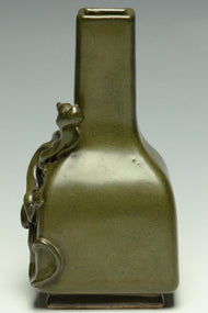 A QING DYNASTY TEADUST GLAZED CHILONG VASE 18TH CENTURY EX. SOTHEBY'S 2015