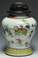 A QING DYNASTY FAMILLE ROSE BOYS JAR WITH WOODEN COVER YONGZHENG PERIOD