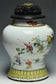 A QING DYNASTY FAMILLE ROSE BOYS JAR WITH WOODEN COVER YONGZHENG PERIOD