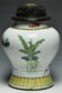 A QING DYNASTY FAMILLE ROSE BOYS JAR WITH WOODEN COVER YONGZHENG PERIOD