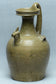 A JIN DYNASTY YUE CELADON CHICKEN-HEAD EWER