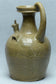 A JIN DYNASTY YUE CELADON CHICKEN-HEAD EWER