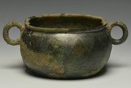 A HAN DYNASTY TWIN HANDLED BRONZE INCENCE BURNER