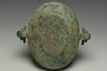 A SPRING AND AUTUMN PERIOD DRAGON HANDLED BRONZE INCENSE BURNER