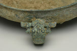 A SPRING AND AUTUMN PERIOD DRAGON HANDLED BRONZE INCENSE BURNER