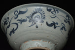 AN EARLY MING DYNASTY BLUE AND WHITE BOWL