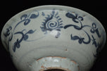 AN EARLY MING DYNASTY BLUE AND WHITE BOWL