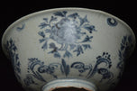 AN EARLY MING DYNASTY BLUE AND WHITE BOWL