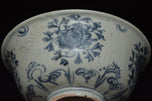 AN EARLY MING DYNASTY BLUE AND WHITE BOWL