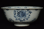 AN EARLY MING DYNASTY BLUE AND WHITE BOWL