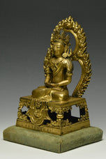 A GILT-BRONZE FIGURE OF AMITAYUS QIANLONG MARK AND PERIOD