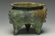 A WESTERN ZHOU DYNASTY ARCHAIC BRONZE RITUAL FOOD VESSEL LI