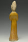 A TANG DYNASTY AMBER GLAZED FIGURE OF A COURT LADY
