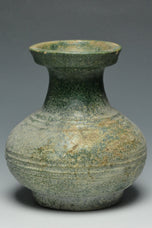 A HAN DYNASTY GREEN GLAZED HU SHAPED VASE